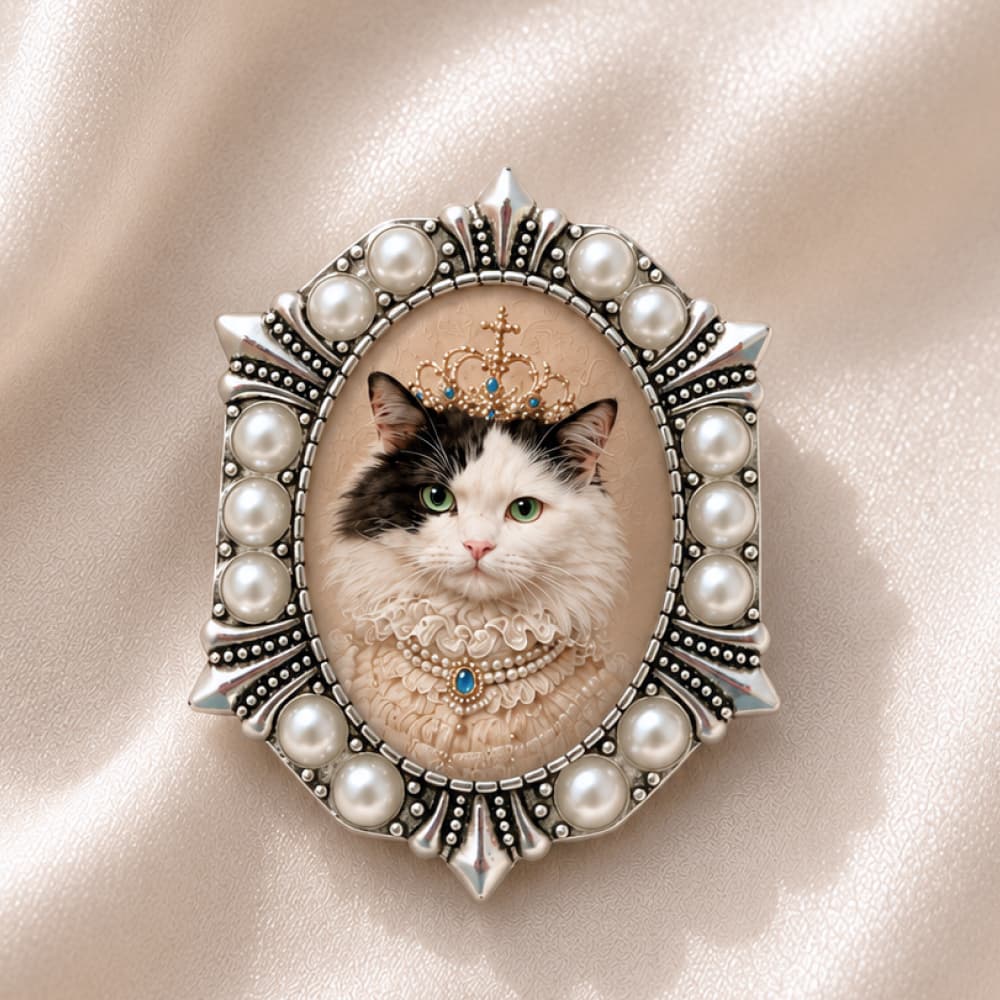 Close-up of Pearl Hex Brooch with custom royal cat portrait.