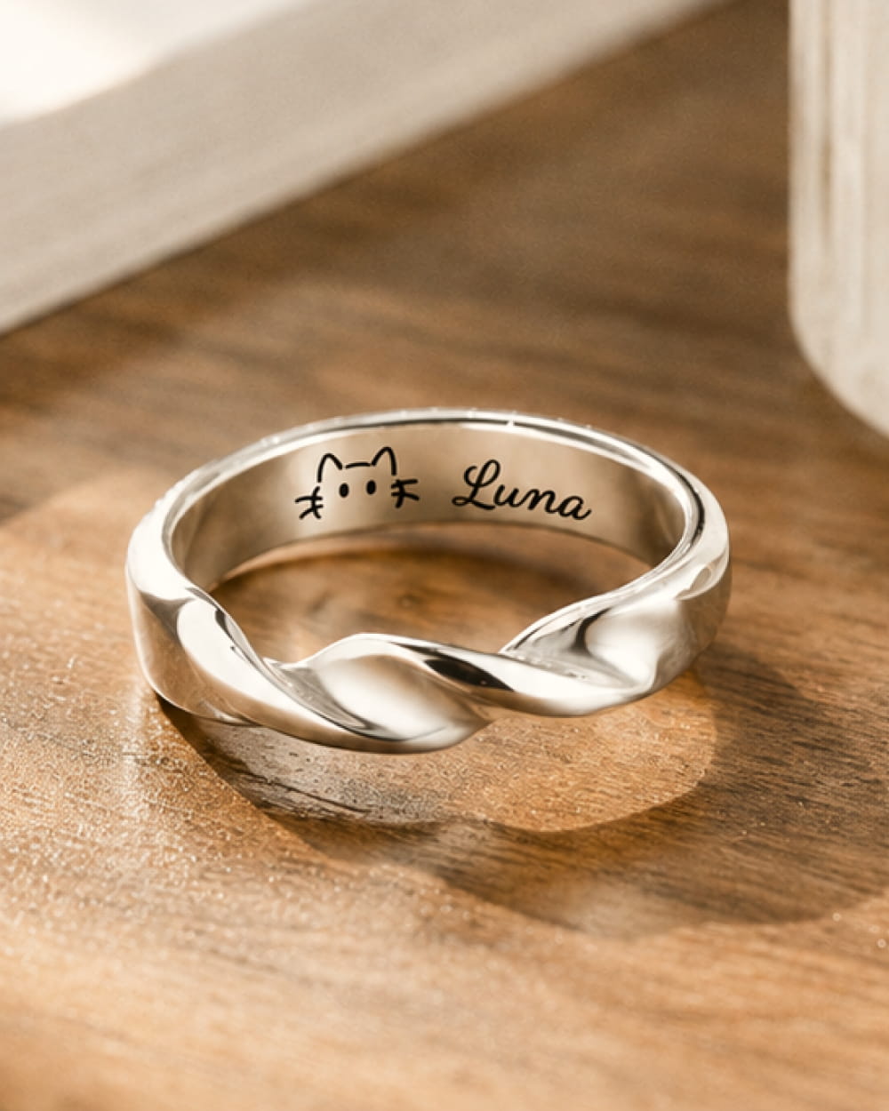 Personalized cat memorial ring engraved with Luna in handmade 999 fine silver.