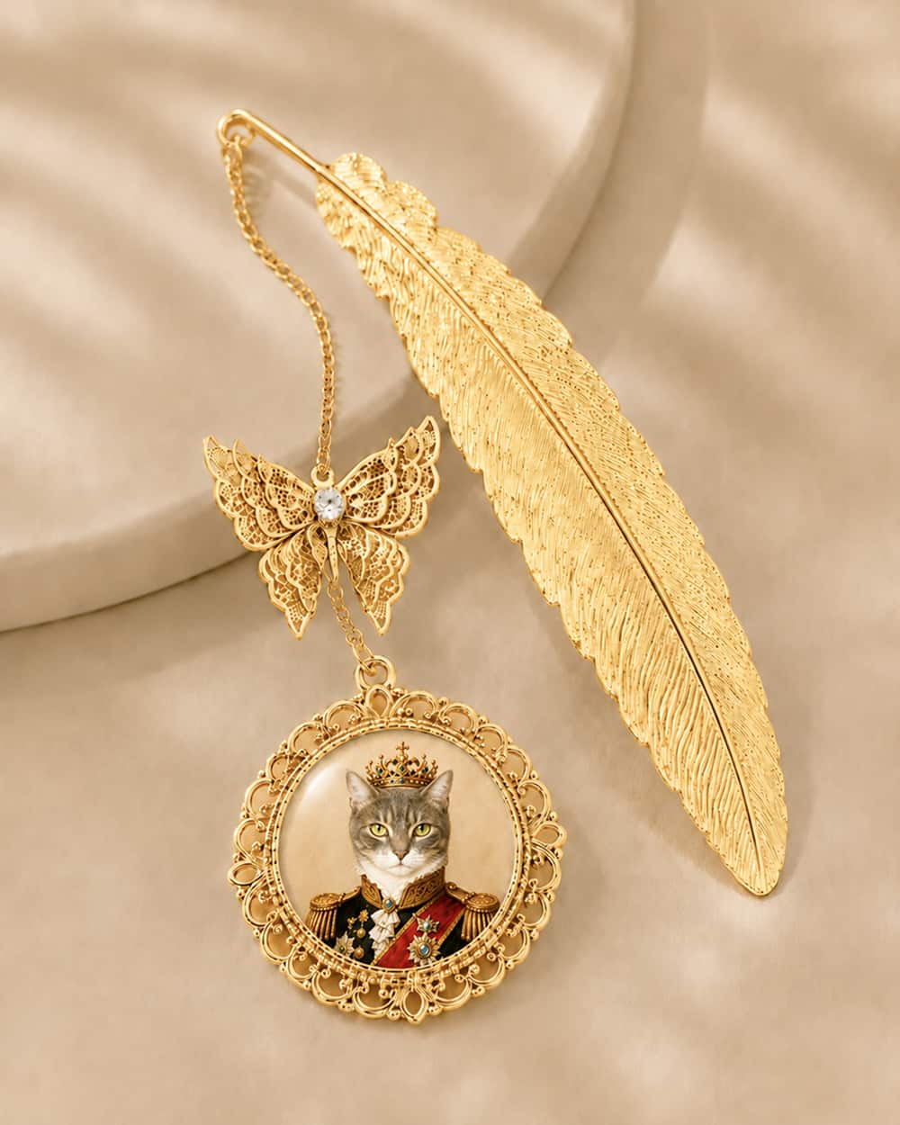 Gold custom pet photo bookmark with royal cat portrait, feather bookmark and butterfly charm.